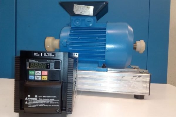Automating Your Garden Watering System Automated garden watering system with motor and control panel for efficient irrigation management.