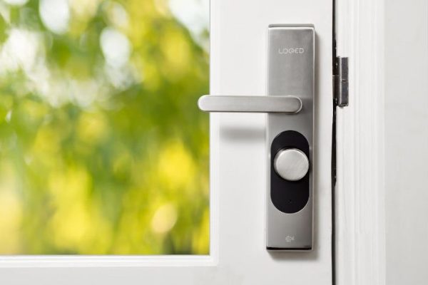 Smart lock on a modern door, illustrating enhanced home security with advanced locking technology