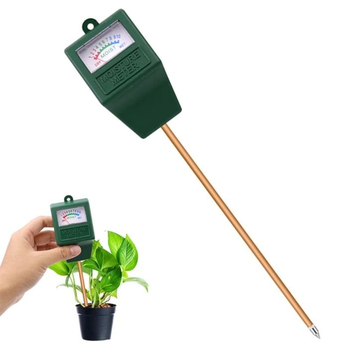 Handheld soil moisture meter with copper probe inserted in a potted plant, showing dial reading for fast surface-level moisture assessment.